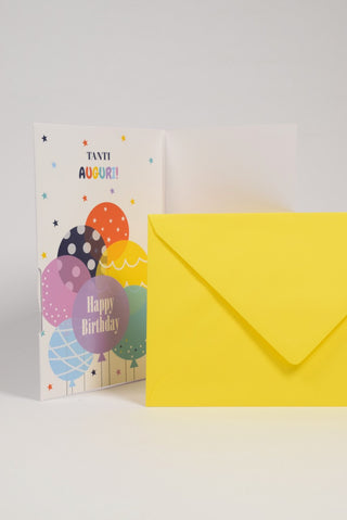 biglietto auguri buon compleanno con rotella bianco interno con busta gialla