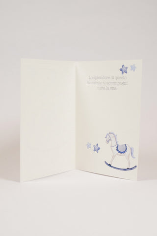 biglietto di auguri di battesimo con cavalluccio a dondolo per bimbo interno con frase di auguri