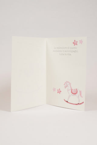 biglietto auguri battesimo con cavalluccio a dondolo interno con frase di auguri