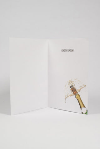 interno biglietto di auguri pensione con bottiglia che stappa