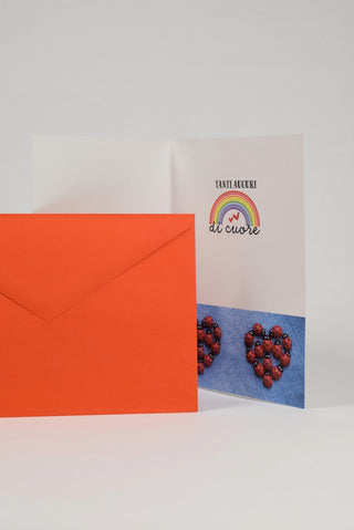 interno biglietto auguri con coccinelle e busta rossa