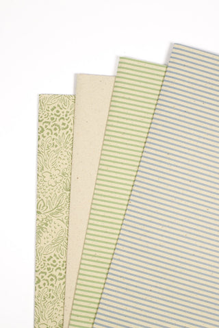 Carta regalo ecologica carta erba verde salvia e azzurro