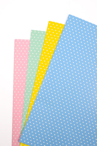 carta regalo pois rosa, verde acqua, giallo e azzurro