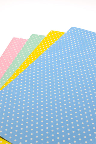 carta regalo pois rosa, verde acqua, giallo e azzurro